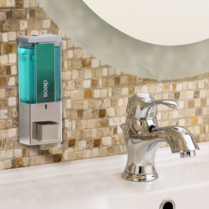 And soap dispenser mounted on wall above sink dispenser amenities