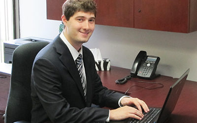 Jarad Fisher Dispenser Amenities on laptop at office desk