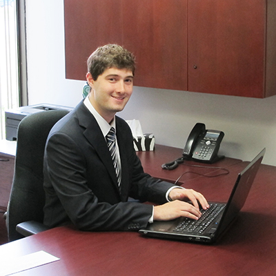 Jarad fisher dispenser amenities on laptop at office desk