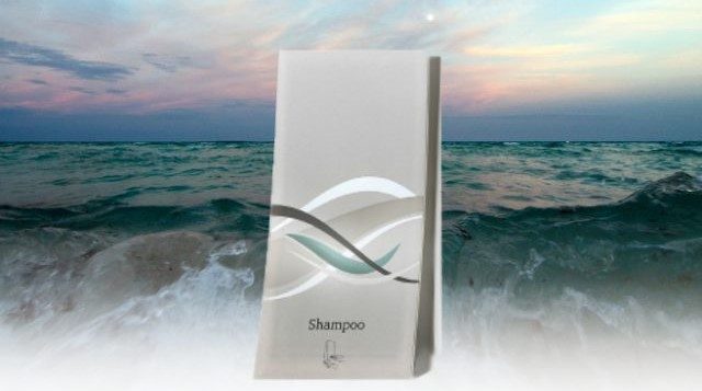 Wave shampoo dispenser with ocean background dispenser amenities