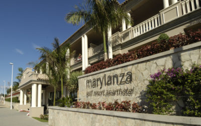 hotel with many columns and palm trees marylanza golf resort hotel dispenser amenities