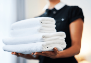 Dispenser Amenities Hotel Housekeeper Carrying Towels Why Hotels Should Switch To Soap Dispensers Blog soap dispenser image