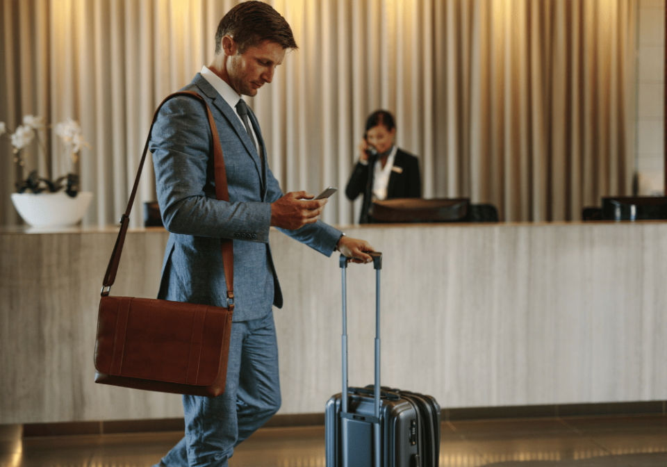 How Hotels Can Reduce Waste Without Sacrificing Guest Experience | Hotel Waste Reduction | Dispenser Amenities Dispenser amenities guest in lobby of hotel hotel waste reduction blog hotel waste reduction image