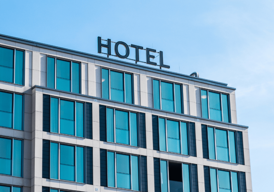 How Much Plastic Does A 100-Room Hotel Generate In One Year? | Environmental Impact | Dispenser Amenities Dispenser amenities close up view of hotel rooms from exterior hotel plastic environmental impact blog environmental impact image